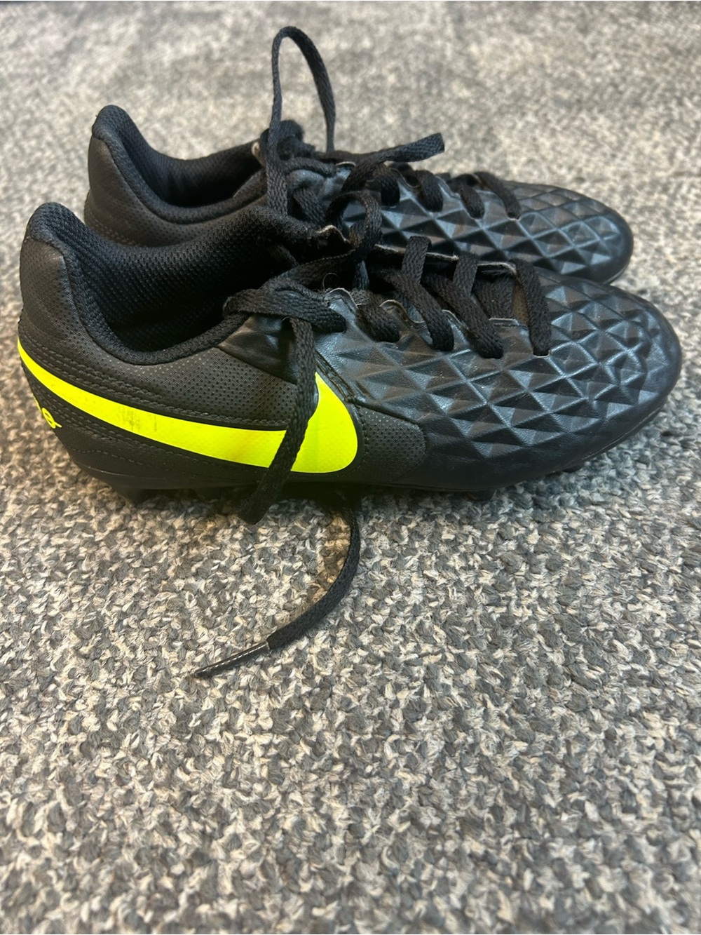 Nike Kids Black Soccer Cleats with Neon Yellow Swoosh